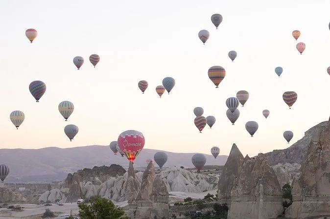 Dozens of balloons over the valleys near Göreme